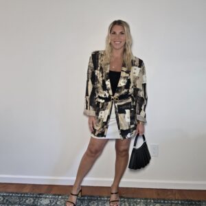 vintage abstract print blazer thrifted outfit styled with white mini skirt and strappy heels