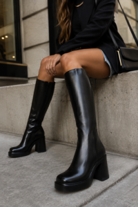 Black leather knee-high boots for women over 40