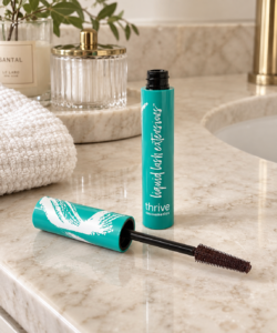 Thrive Causemetics mascara shown in a beauty setting