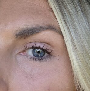 Laura Geller Kajal Longwear mascara applied to mature lashes