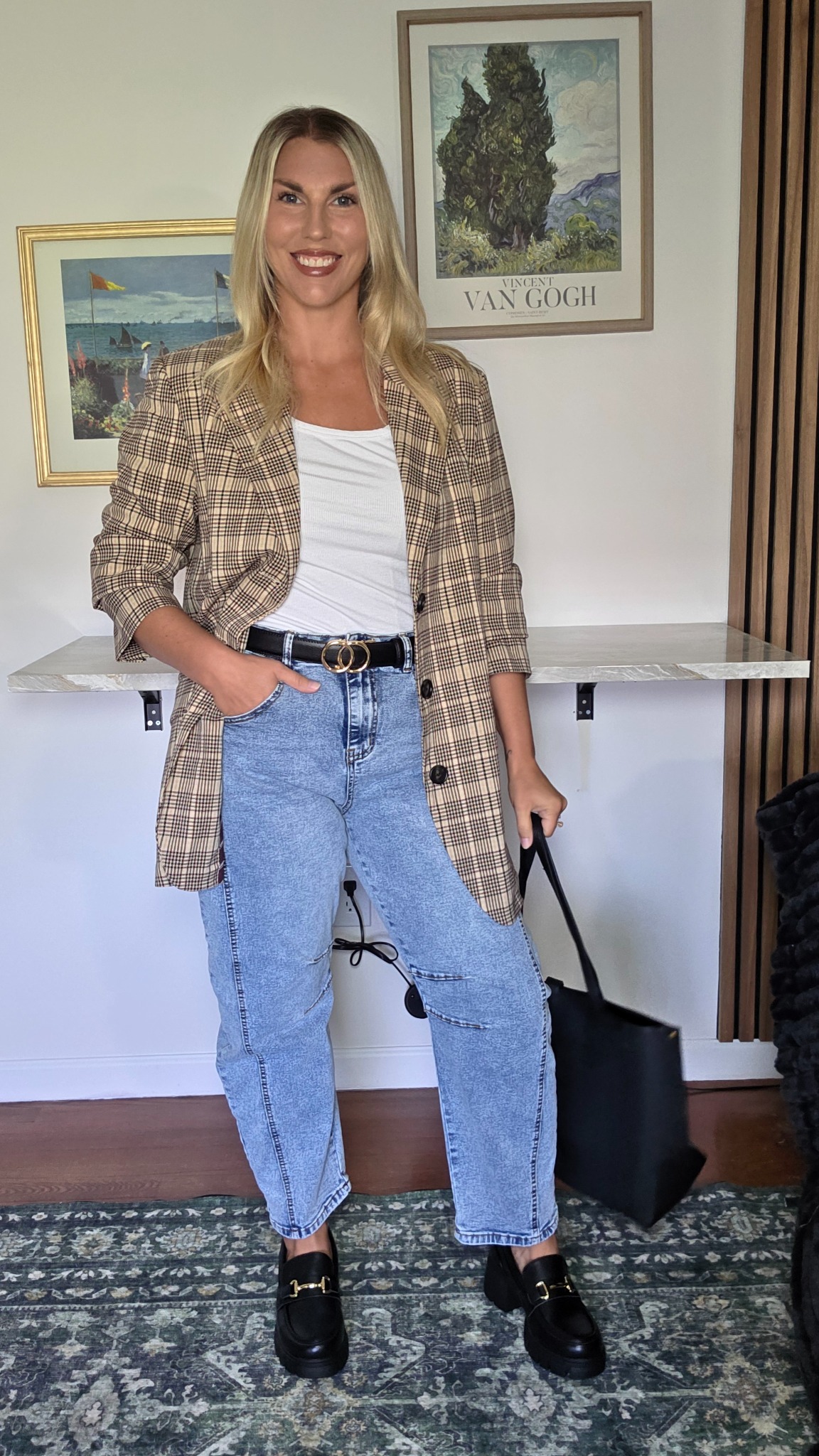 Barrel-leg jeans with fitted white top, oversized tan plaid blazer and chunky black loafers